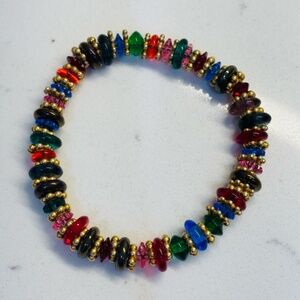 Rainbow crystal beads18 kt plated gold spacers. Elastic bracelet